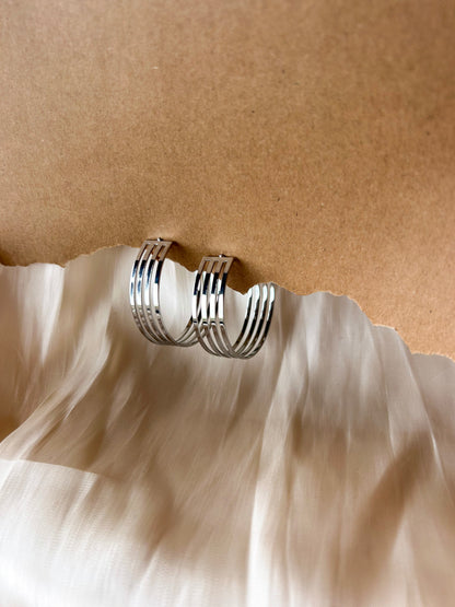 Calm circle oorbellen - Zilver